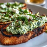 Springtime fava bean and mint appetizer, bright with lemon and fresh herbs.