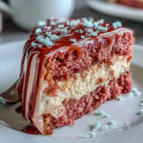 Moist Rosé Velvet Cake with creamy frosting and shimmering gold drip perfect for celebrations.